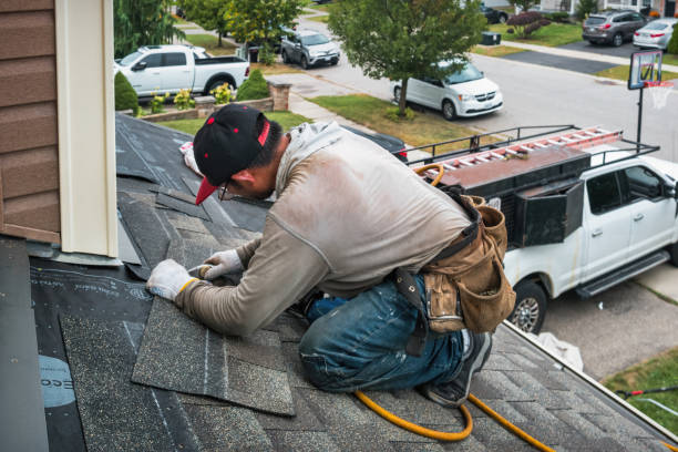 Professional Roofing technician working in Island Lake, IL